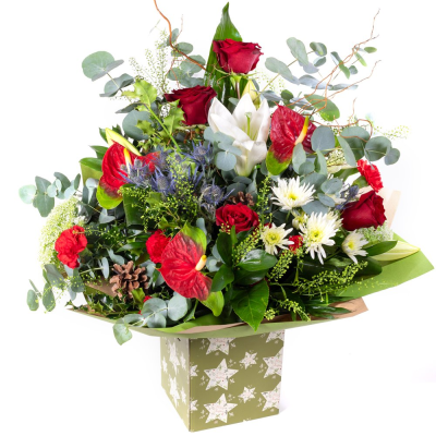 The Grand Christmas Elegance - Make the season unforgettable with The Grand Christmas Elegance. A show-stopping arrangement of rich festive tones and luxurious textures, beautifully styled with seasonal foliage and elegant finishing touches. Designed to impress, it’s the perfect centerpiece for Christmas gifting and celebrations.